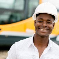 An asian couple looking at their laptop